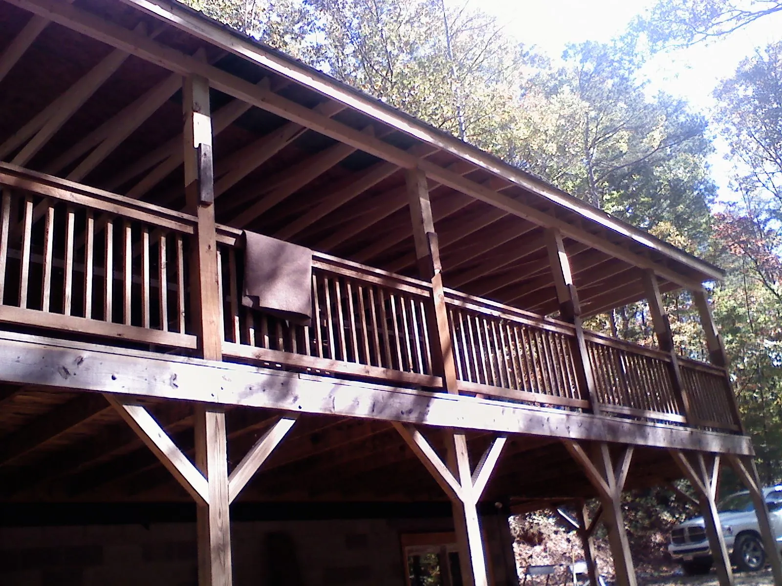Timber framing under a new elevated porch and deck — Roof Leak Repair in Hanson by Roofing Brothers